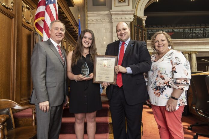 State Rep. Shae Sortwell presented a Hometown Hero award to Grace Fuss.