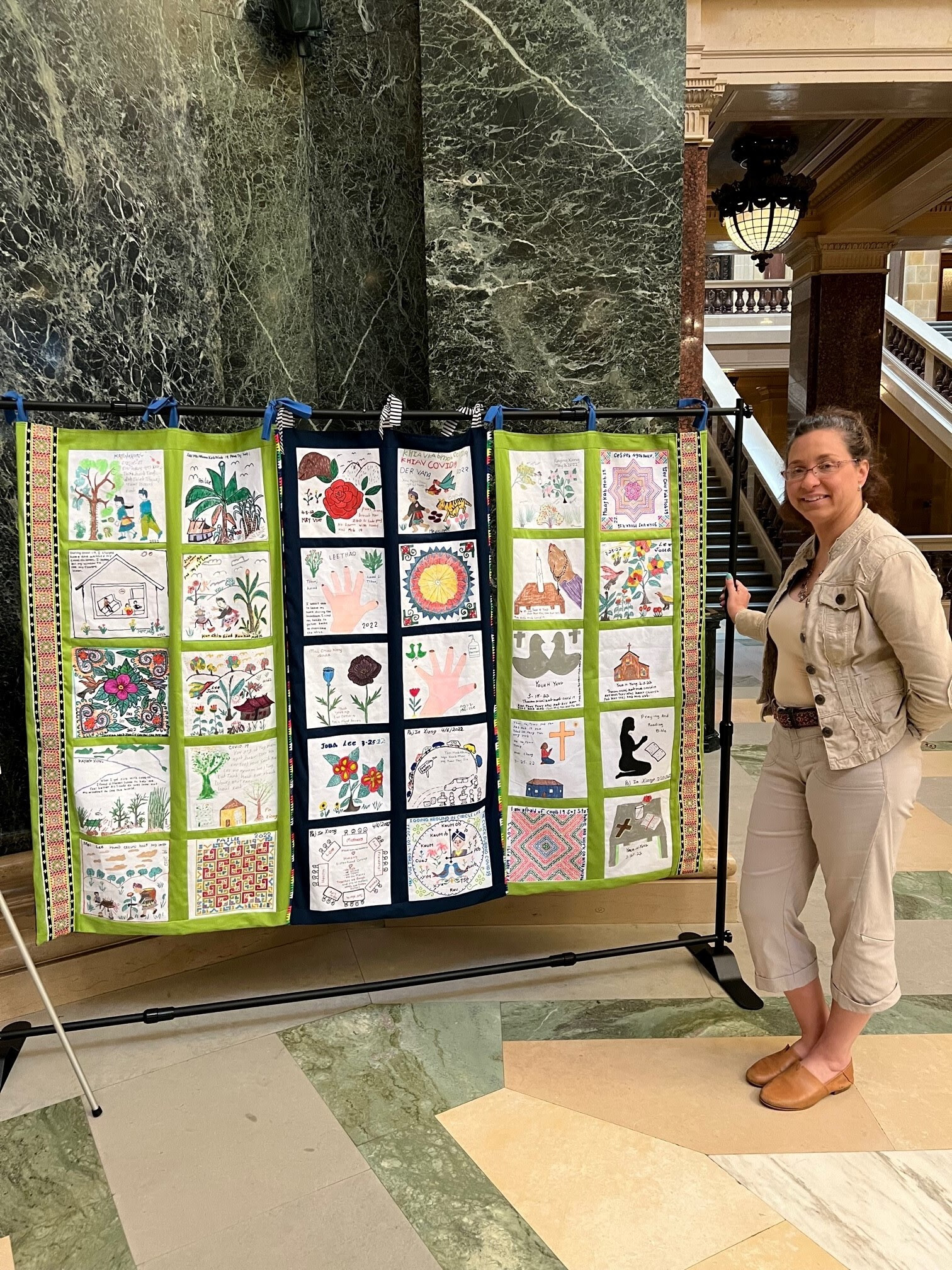 Sen. Rachael Cabral-Guevara visited the AANHPI (Asian American, Native Hawaiian, and Pacific Islander) Month Exhibit in the Capitol Rotunda in Madison.