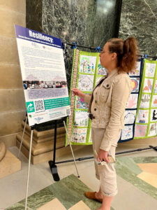 Sen. Rachael Cabral-Guevara visited the AANHPI (Asian American, Native Hawaiian, and Pacific Islander) Month Exhibit in the Capitol Rotunda in Madison.