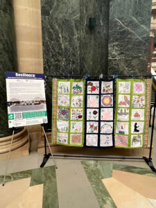 Sen. Rachael Cabral-Guevara visited the AANHPI (Asian American, Native Hawaiian, and Pacific Islander) Month Exhibit in the Capitol Rotunda in Madison.