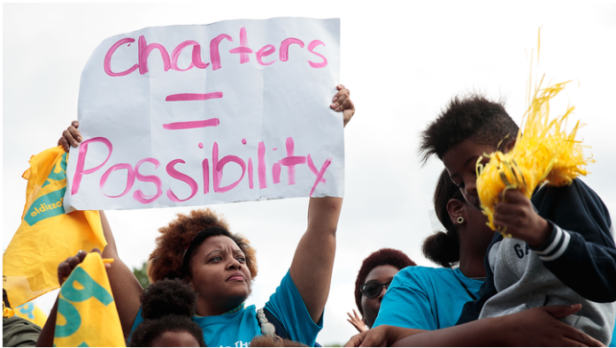 Parents, schoolchildren and education activists rally during an event supporting public charter schools and protesting New York's racial achievement gap in education, in Prospect Park, September 28, 2016 in the Brooklyn borough of New York City. The #PathToPossible rally and march, organized by the Families for Excellent Schools, is calling for New York City to double its public charter school sector to 200,000 students by 2020. An estimated 25,000 people attended the rally. (Photo by Drew Angerer/Getty Images)