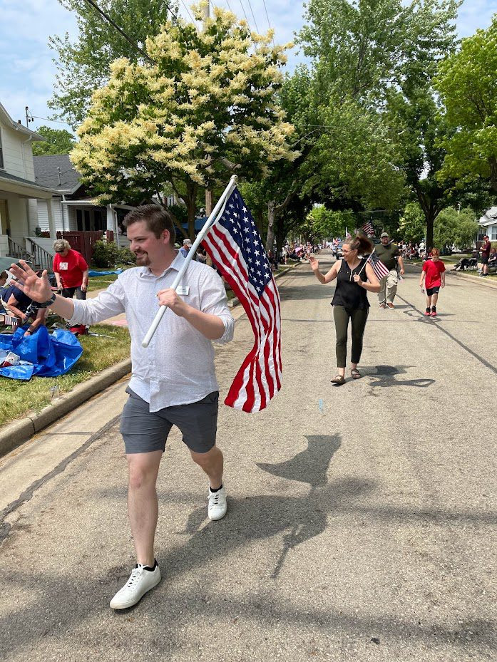 State Rep. Nate Gustafson marched in Appleton's Flag Day Parade.