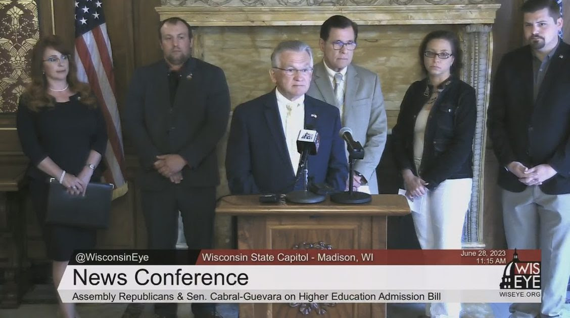 State Rep. Nate Gustafson and colleagues discuss the higher education admissions bill.