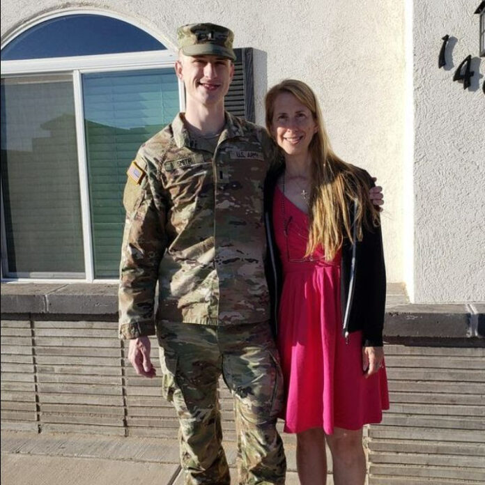 State Rep. Joy Goeben with her son, ready to deploy to Poland.