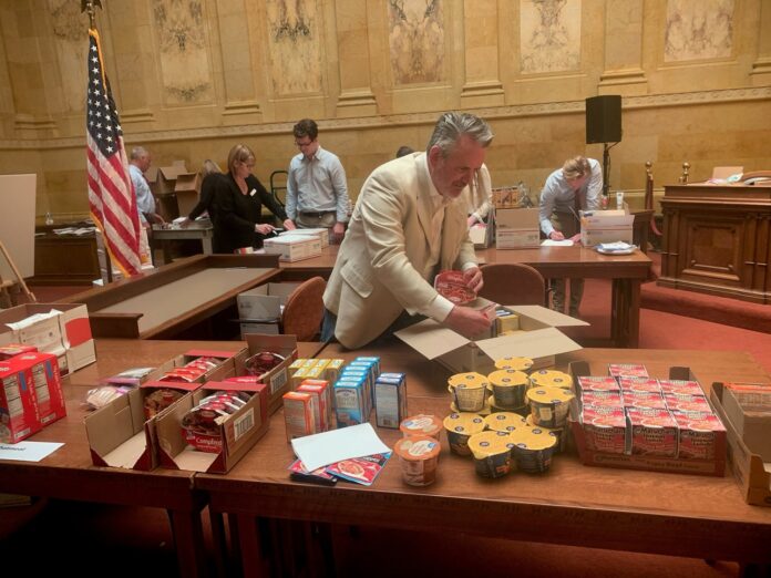 Wisconsin State Rep. David Steffen and colleagues recently packed over 100 care packages for Wisconsinites serving in the military.