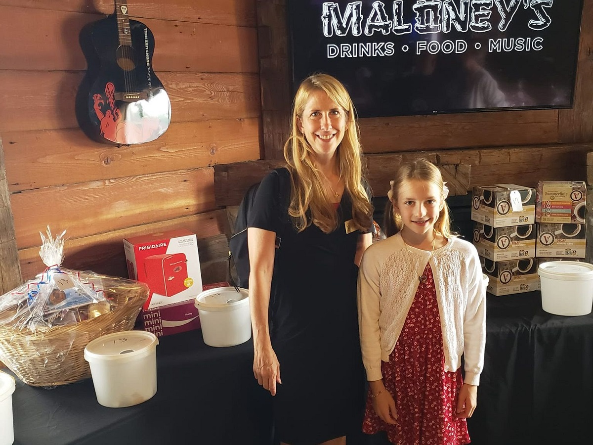 The All American Garage held a fundraising event at Maloney's in Kaukauna.