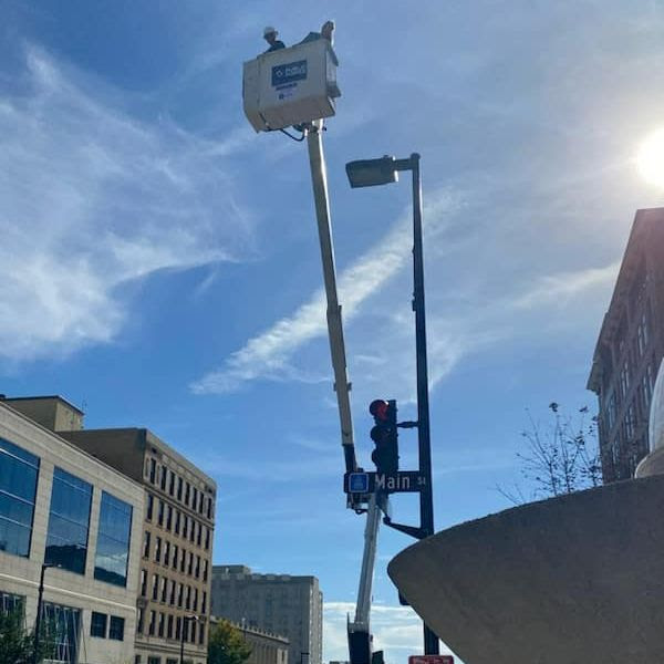 Wisconsin State Rep. Joy Goeben has a great view of the State Capitol in a bucket truck with Municipal Electric Utilities of Wisconsin.