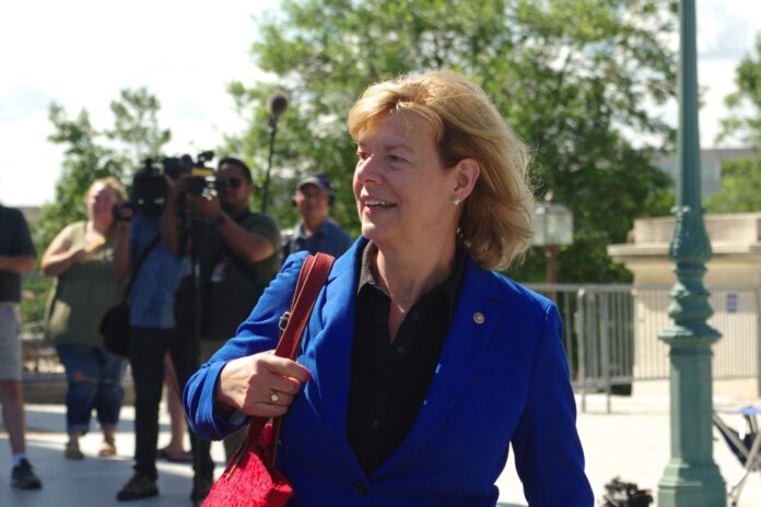 Tammy Baldwin is fully on board with the climate change agenda, single payer health care, and gun control to name a few.