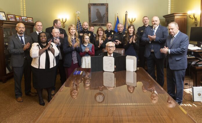 Wisconsin State Rep. Joy Goeben attended the signing of Wisconsin Act 225. She authored this legislation, which bans child sex dolls in Wisconsin.