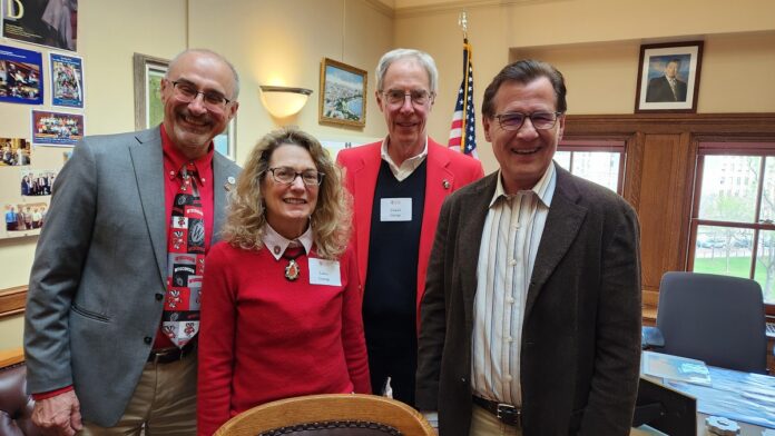 John Siebers, Laura George and Daniel George from the UW-Wisconsin Alumni Association visited with State Rep. Dave Murphy.