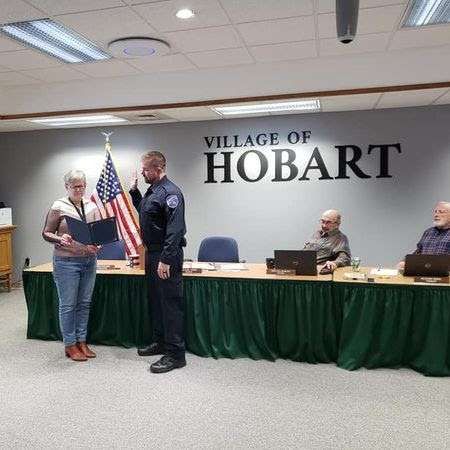 Wisconsin State Rep. Joy Goeben attended the Hobart Village board meeting where the Hobart-Lawrence Police Department (HLPD) officially welcomed and swore in its newest officer, Blake Main. 