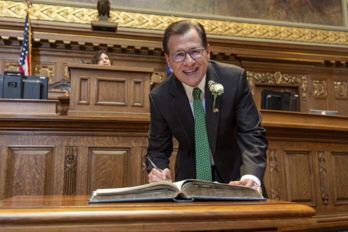 Dave Murphy was sworn in to his seventh term in the State Assembly and signed Wisconsin's Oath of Office Book.