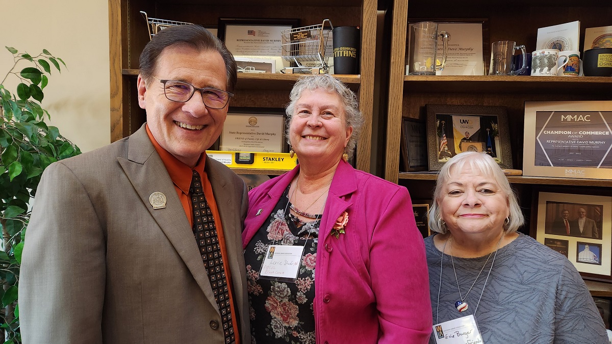 Wisconsin State Rep. Dave Murphy visited at the Capitol with representatives of the Wisconsin Library Association.