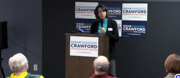 Susan Crawford took Wisconsin judicial elections to a new low when, as a candidate for Supreme Court, she chose to participate in a major donor briefing on January 13.