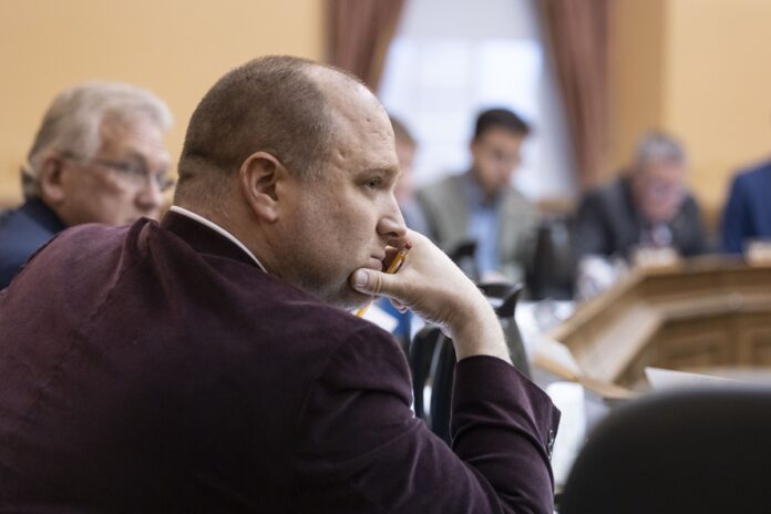 Wisconsin State Rep. Shae Sortwell listens to testimony at a public hearing held by the Committee on Criminal Justice and Public Safety to consider six bills.