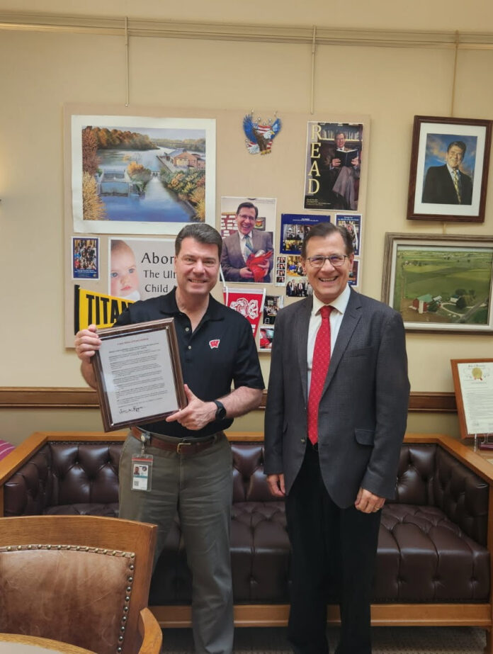 Wisconsin State Rep. Dave Murphy presented Steve Knudson with a commendation from Free Speech For Campus.
