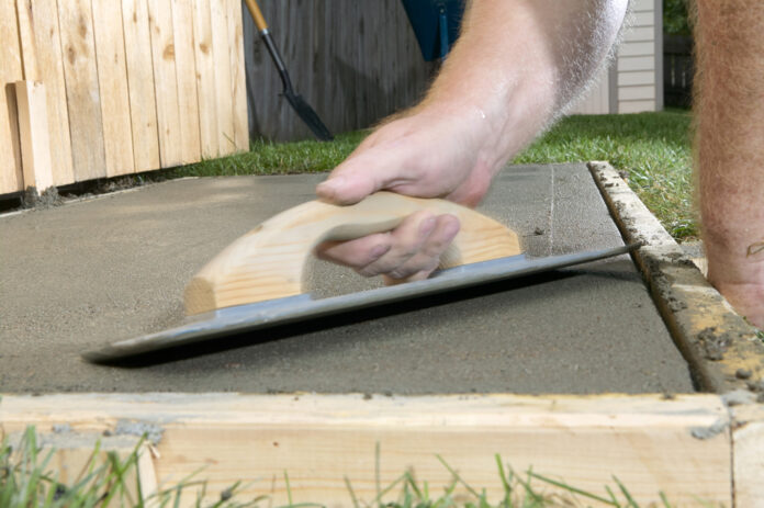 The Appleton municipal code states that any accessory structure over 100 square feet must be on and anchored to a concrete slab -- yet a homeowner constructed a structure of over 100 square feet attached only to some pavers. How will this be resolved?