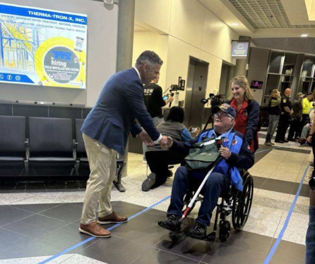 Congressman Tony Wied welcomed home the Stars and Stripes Honor Flight of Champions at the Austin Straubel Airport.