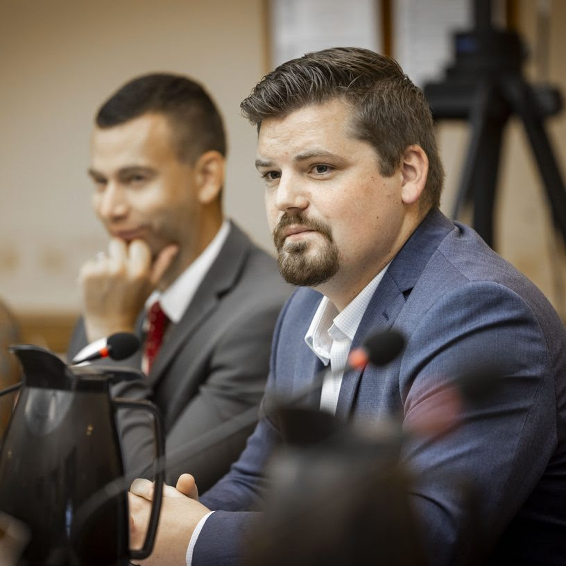 Wisconsin State Rep. Nate Gustafson listens during a hearing of the Committee on Ways and Means on 8/21/2025.