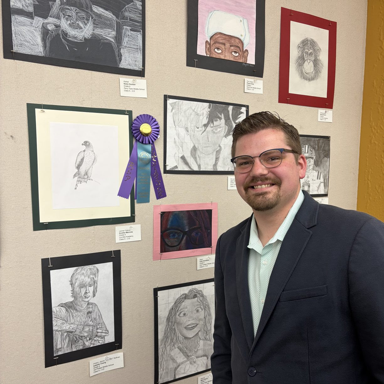 Wisconsin State Rep. Nate Gustafson stopped at the Oshkosh Public Library to select a piece of artwork created by a local student to display in his office in Madison.