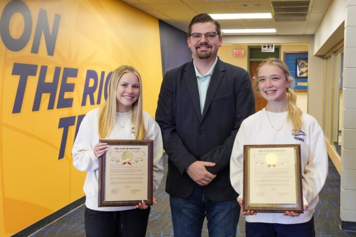 Wisconsin State Rep. Nate Gustafson presented a legislative citation to Vivie and Adel of St. Mary Catholic High School for their remarkable achievement of winning back-to-back WIAA State Championships in Doubles Tennis.