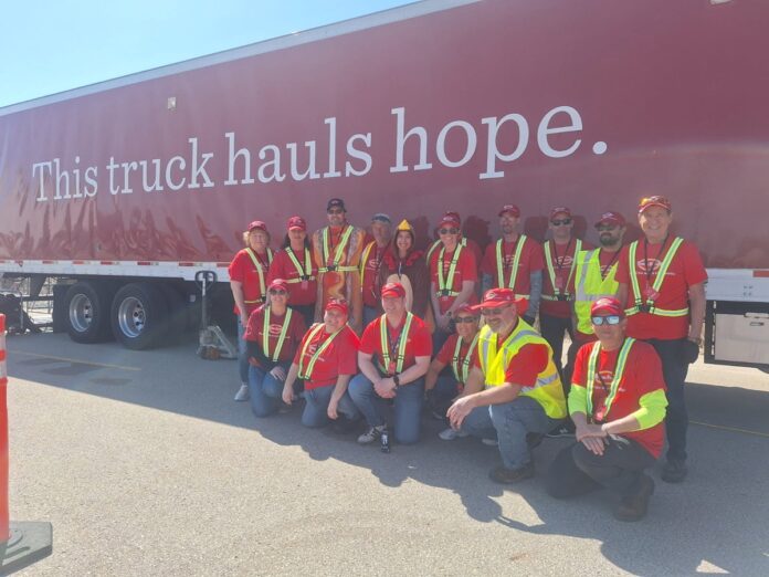 Wisconsin State Rep. Dave Murphy aided in local disaster relief, helping out the Tyson Foods 