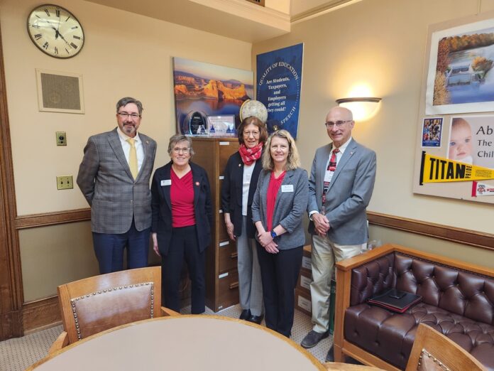 Representatives from the UW Alumni Association visited the office of State Rep. Dave Murphy on lobby day.